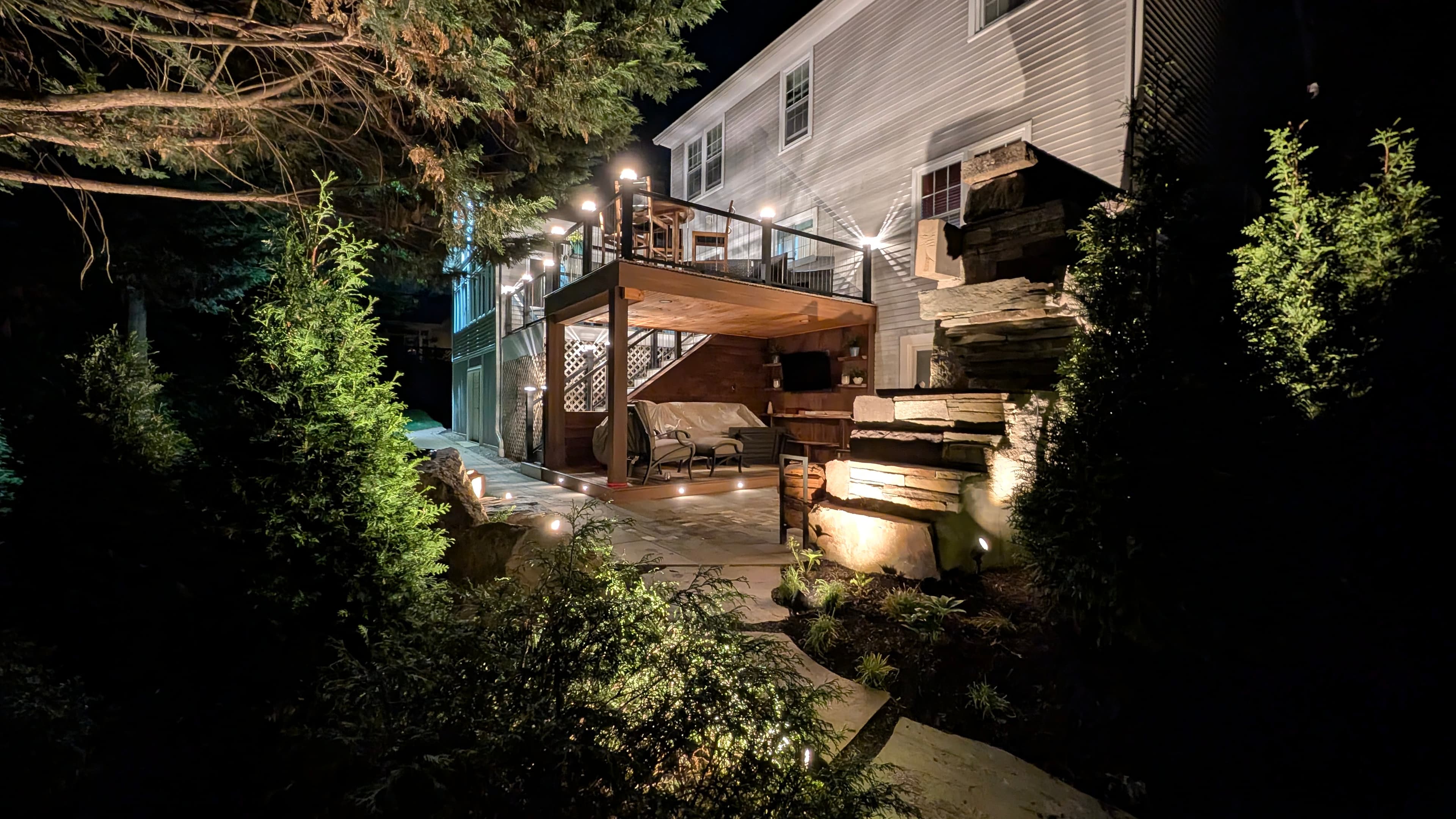Project Wildfire garden, boulders, rooftop lounge, and fireplace lighting